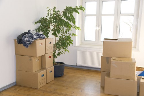 Well-arranged storage unit with boxes and furniture for long-term storage
