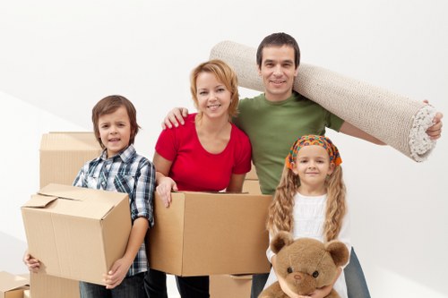 Professional mover handling furniture during a man and van job